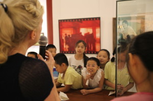 student teacher mimicing microphone