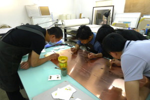 Printing Dept techies work on Copper engraving for Wu Y copy